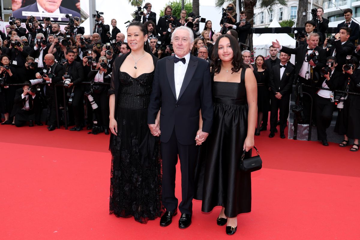 CANNES, FRANCE - MAY 13: (L-R) Tiffany Chen, Robert De Niro and Helen Grace De Niro attend the red carpet for the opening ceremony and "Partir Un Jour" (Leave One Day) screening at the 78th annual Cannes Film Festival at Palais des Festivals on May 13, 2025 in Cannes, France. (Photo by Daniele Venturelli/WireImage)