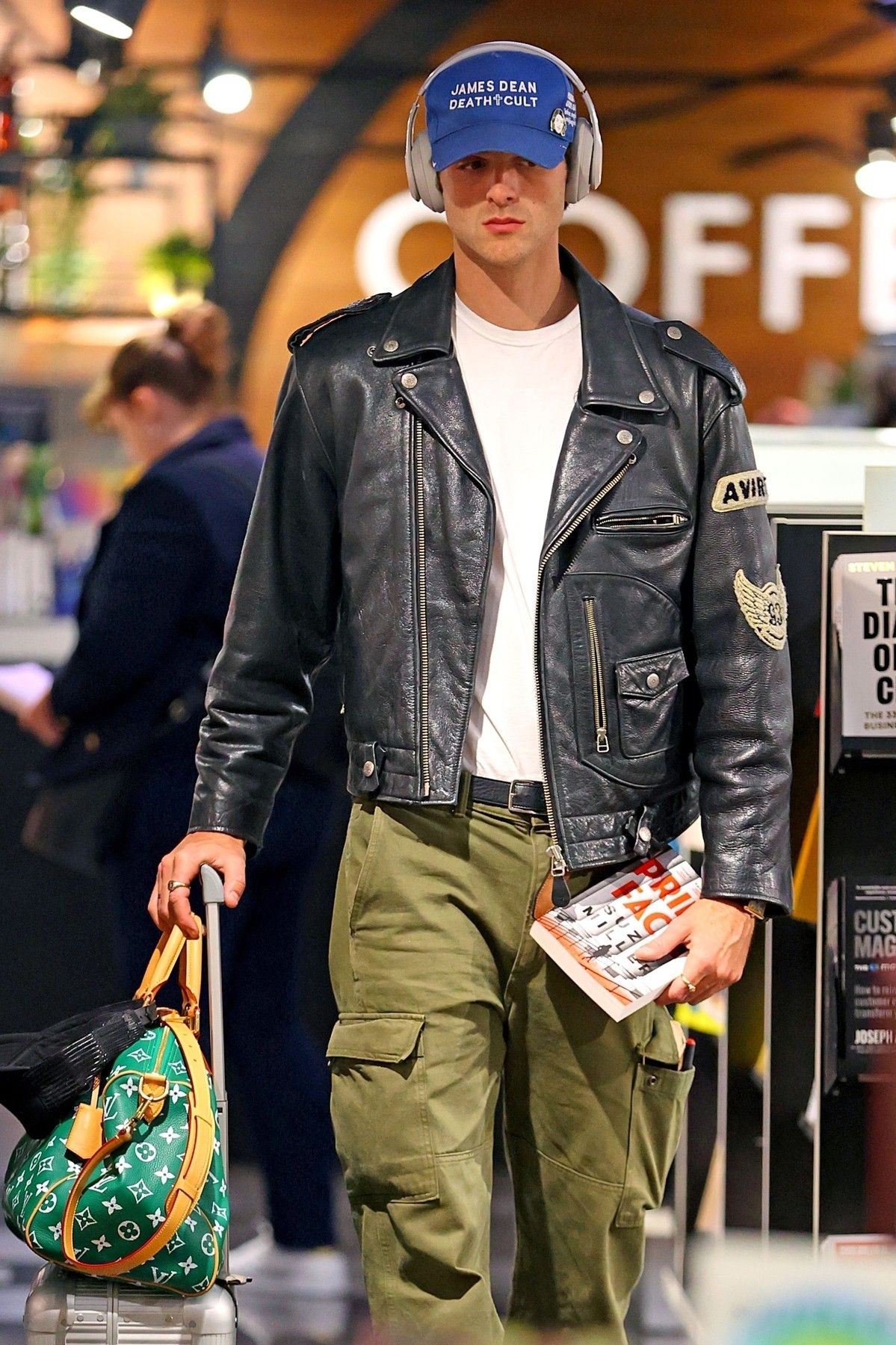 Sydney, AUSTRALIA  - *EXCLUSIVE*  - Actor Jacob Elordi wears a ‘James Dean Death Cult’ Cap and Leather jacket as he browses the book store at Sydney Airport.

BACKGRID USA 28 OCTOBER 2023,Image: 817456162, License: Rights-managed, Restrictions: RIGHTS: WORLDWIDE EXCEPT IN AUSTRALIA, NEW ZEALAND, UNITED KINGDOM, Model Release: no, Pictured: Jacob Elordi