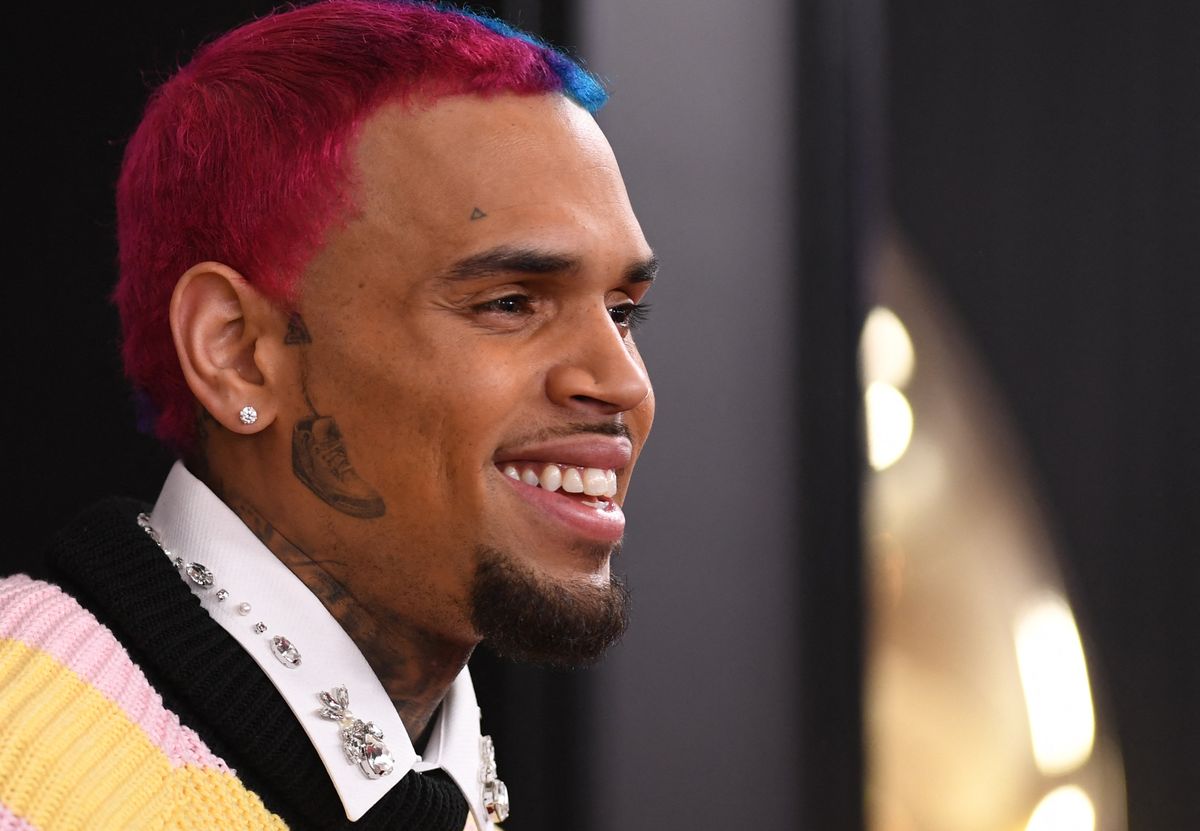 (FILES) US rapper Chris Brown arrives for the 62nd Annual Grammy Awards on January 26, 2020, in Los Angeles. American R&B singer Chris Brown, was arrested on May 15, 2025 in the UK on suspicion of a serious 2023 assault at a London nightclub, reports said. Brown, 36, was detained in the early hours of May 15 at a hotel in the northwestern city of Manchester, The Daily Telegraph and The Sun reported. London's Metropolitan Police said a 36-year-old man was in custody on suspicion of grievous bodily harm, without naming him. (Photo by VALERIE MACON / AFP)