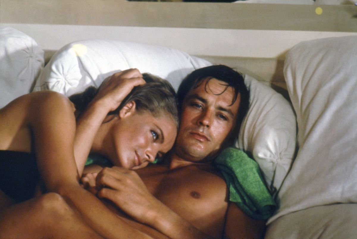 Alain Delon and Romy Schneider on the set of "La Piscine". (Photo by Sunset Boulevard/Corbis via Getty Images)