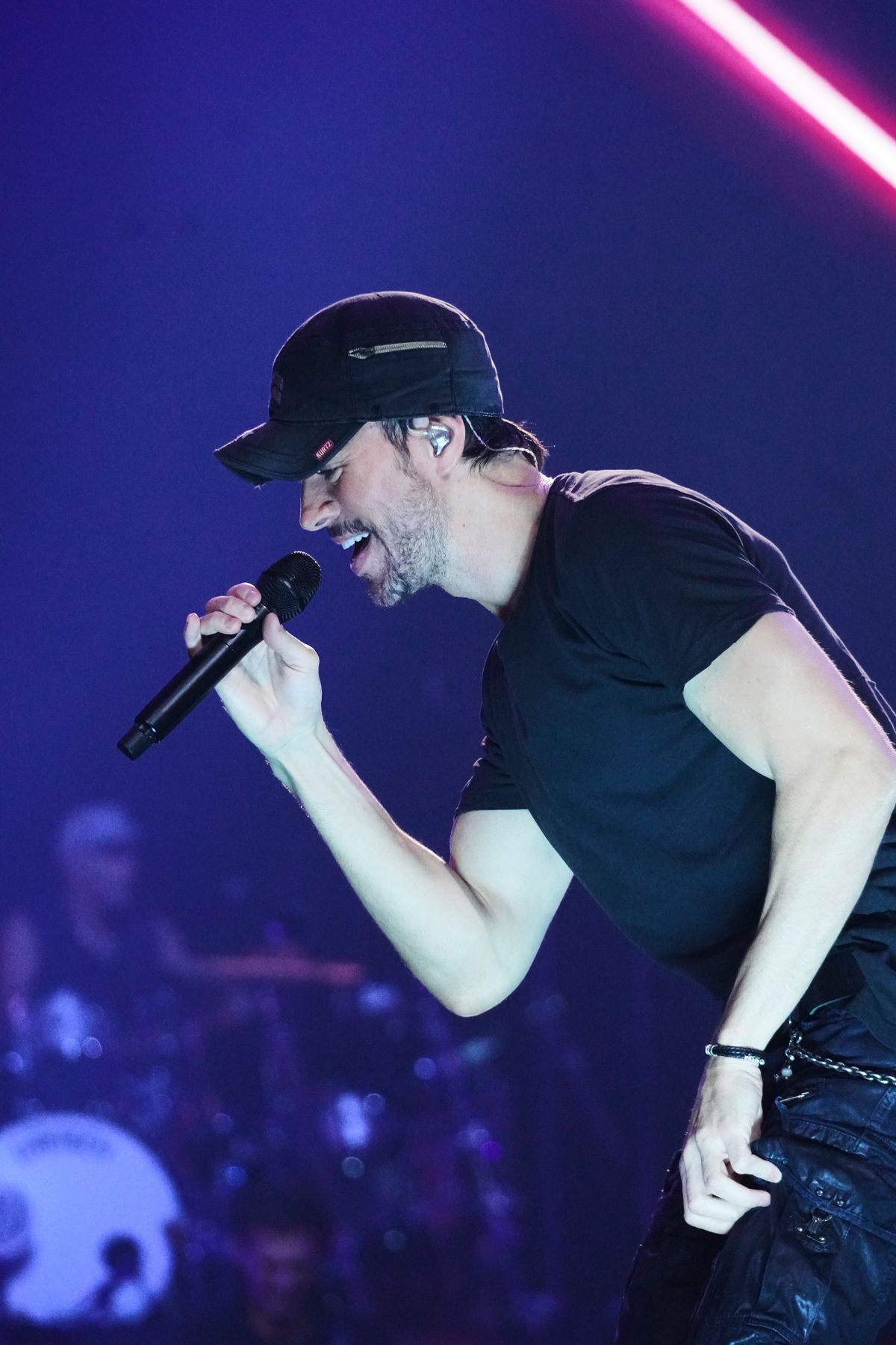 MIAMI, FLORIDA - NOVEMBER 10: Enrique Iglesias performs during the Enrique Iglesias, Ricky Martin and Pitbull In Concert at Kaseya Center on November 10, 2023 in Miami, Florida. (Photo by Romain Maurice/Getty Images)