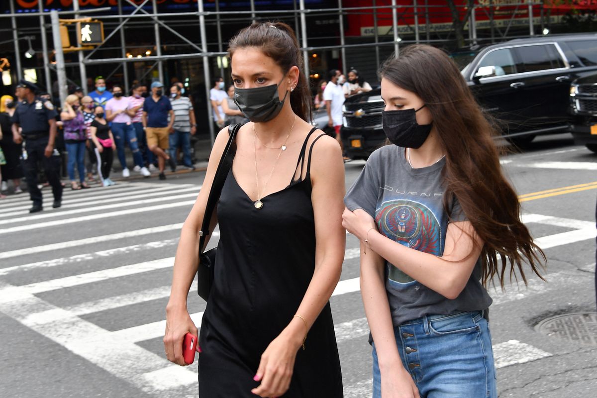 US actress Katie Holmes and daughter Suri Cruise arrive the opening night premiere of "In The Heights" during the Tribeca Festival at the United Palace Theatre on June 9, 2021 in New York City. (Photo by Angela Weiss / AFP)