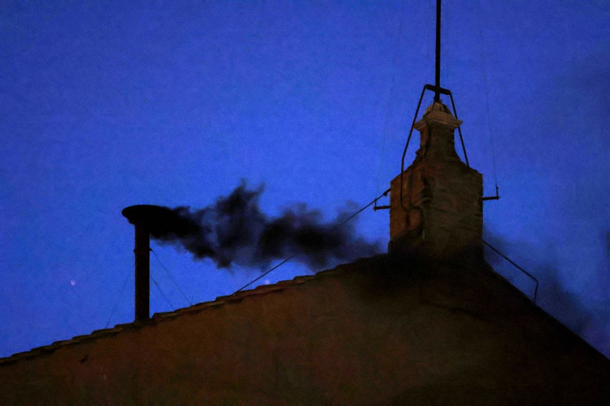 VATICAN CITY, VATICAN, MAY 07:
Black smoke emerges from the chimney atop the Sistine Chapel, signaling that a new Pope has not yet been elected by the Conclave at the Vatican on May 7, 2025. (Photo by Riccardo De Luca/Anadolu via Getty Images)