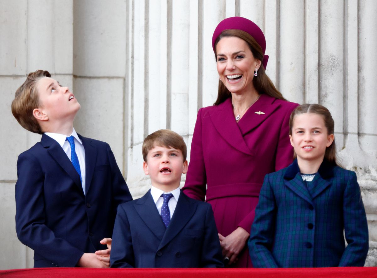 LONDON, UNITED KINGDOM - MAY 05: (EMBARGOED FOR PUBLICATION IN UK NEWSPAPERS UNTIL 24 HOURS AFTER CREATE DATE AND TIME) Prince George of Wales, Prince Louis of Wales, Catherine, Princess of Wales and Princess Charlotte of Wales watch a flypast from the balcony of Buckingham Palace to mark the 80th anniversary of VE Day on May 5, 2025 in London, England. The King and Queen, joined by Members of the Royal Family, will take part in events from May 5th to May 8th to commemorate the 80th anniversary of VE Day, which signalled the end of the Second World War in Europe. (Photo by Max Mumby/Indigo/Getty Images)