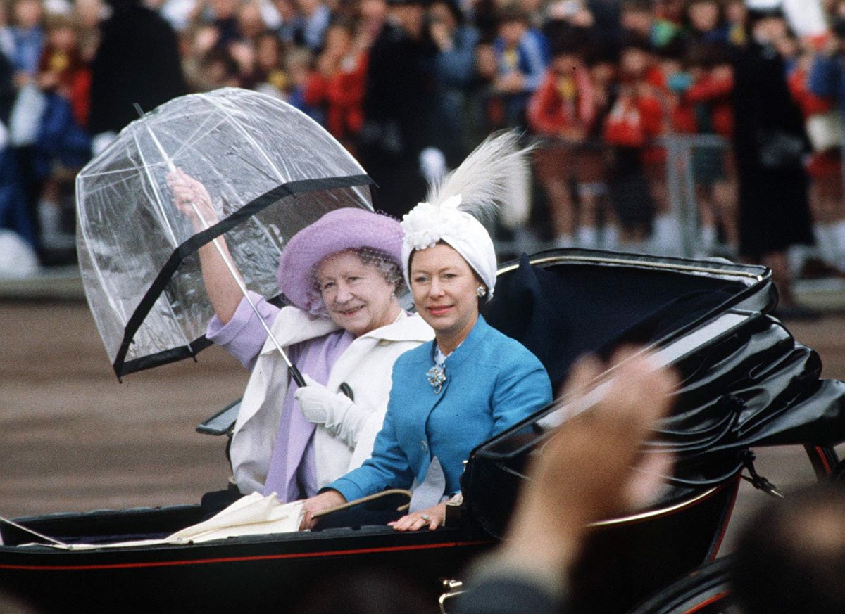 LONDON, UNITED KINGDOM - JUNE 12:  Princess Margaret Wearing A Turban-style Hat In The Carriage Procession For Trooping The Colour With The Queen Mother Who Uses A Transparent Umbrella So That She Can Be Seen  (Photo by Tim Graham Photo Library via Getty Images)