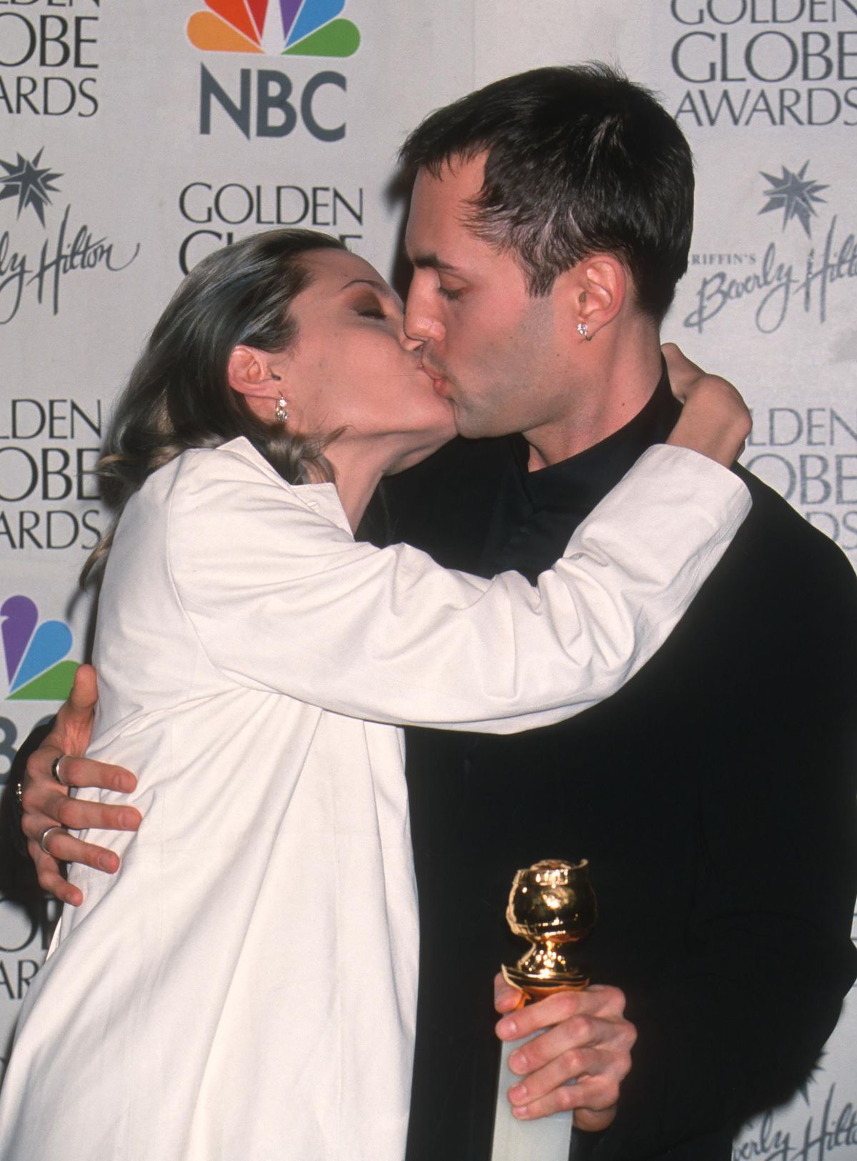 Sibling actors Angelina Jolie and James Haven kiss as they attend the 57th annual Golden Globe Awards at the Beverly Hilton Hotel, Beverly Hills, California, January 24, 2000. (Photo by Ron Galella, Ltd./Ron Galella Collection via Getty Images)