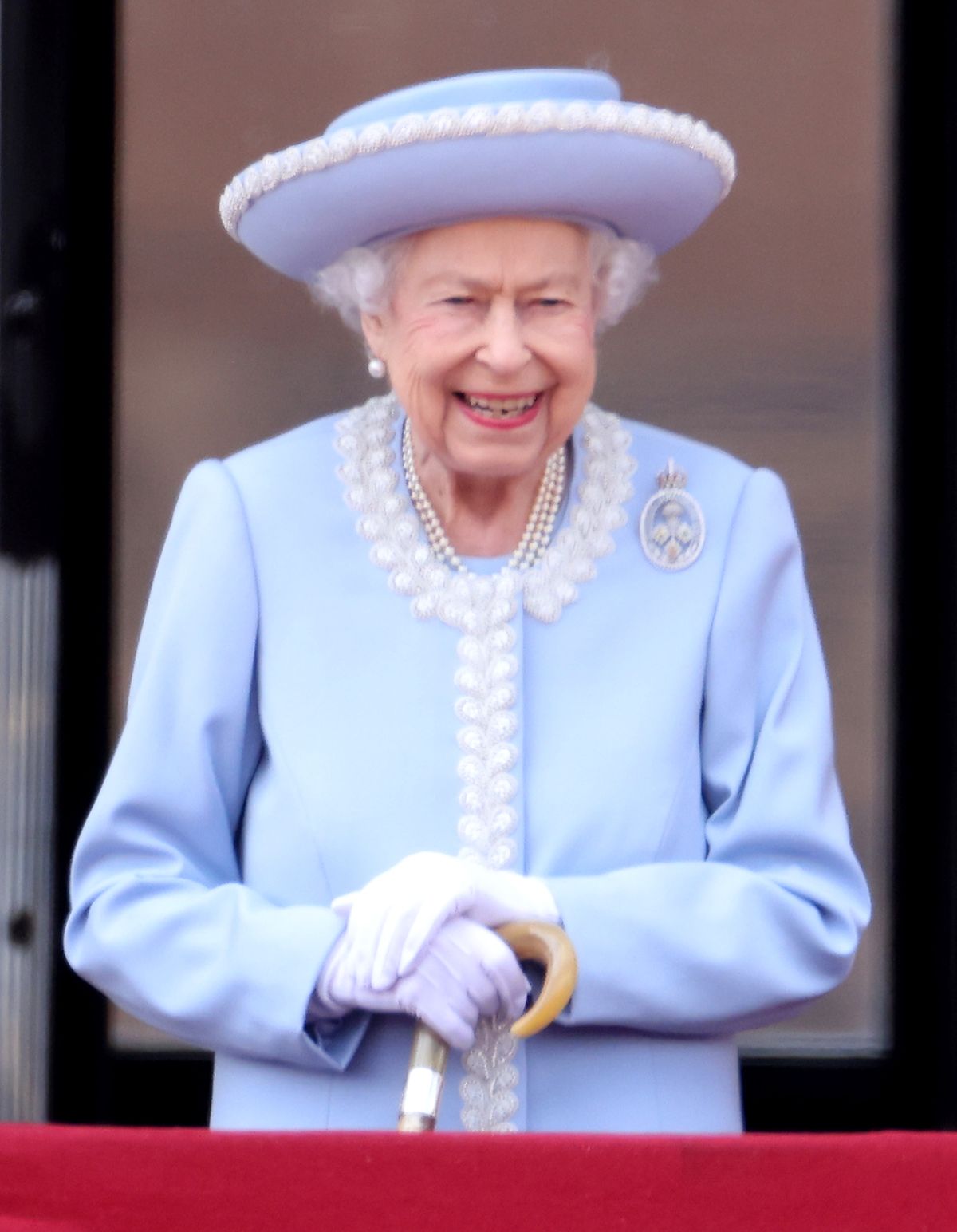 LONDON, ENGLAND - JUNE 02: Queen Elizabeth II smiles on the balcony during Trooping The Colour on June 02, 2022 in London, England. The Platinum Jubilee of Elizabeth II is being celebrated from June 2 to June 5, 2022, in the UK and Commonwealth to mark the 70th anniversary of the accession of Queen Elizabeth II on 6 February 1952. (Photo by Chris Jackson/Getty Images)