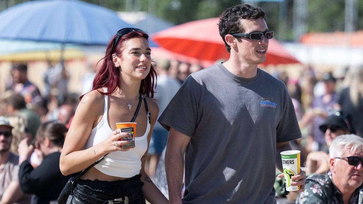 GLASTONBURY, ENGLAND - JUNE 29: Dua Lipa and Callum Turner during day four of Glastonbury Festival 2024 at Worthy Farm, Pilton on June 29, 2024 in Glastonbury, England. Founded by Michael Eavis in 1970, Glastonbury Festival features around 3,000 performances across over 80 stages. Renowned for its vibrant atmosphere and iconic Pyramid Stage, the festival offers a diverse lineup of music and arts, embodying a spirit of community, creativity, and environmental consciousness. (Photo by Samir Hussein/WireImage)