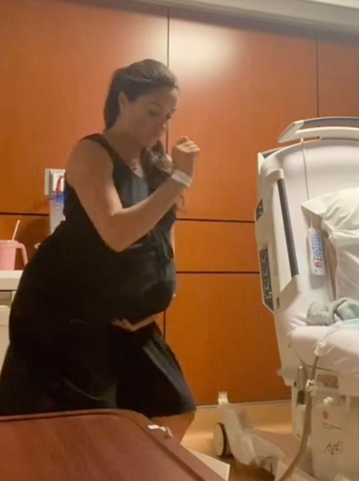 Picture MUST credit: Meghan / Instagram Meghan Markle has shared a video of herself moving to a dance tune to induce labour while expecting daughter Lilibet. The Duchess of Sussex, 43, posted the clip on Instagram in celebration of her daughter's fourth birthday. Meghan told her followers in a notice: "Four years ago today, this also happened. "Both of our children were a week past their due dates… so when spicy food, all that walking, and acupuncture didn’t work - there was only one thing left to do!" The mother-of-two , wearing a black maternity frock with a button=up back, is seen twerking to a tune called The Baby Momma Dance by a YouTube character called Starrkeisha. Prince Harry, wearing a a grey hoodie, at one point shuffled across the room before. Picture supplied by JLPPA