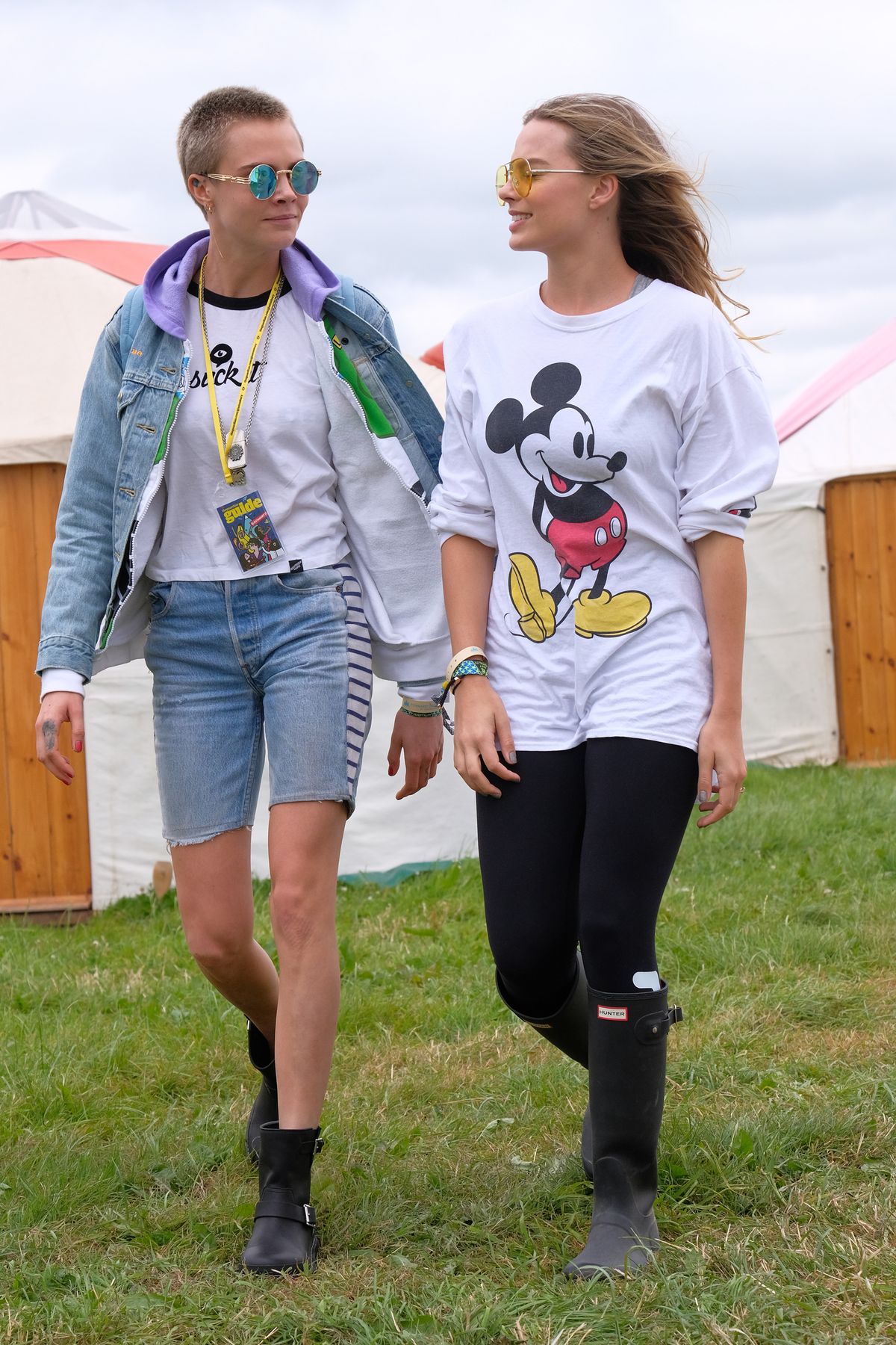 GLASTONBURY, ENGLAND - JUNE 24:  Cara Delevingne (L) and Margot Robbie attend day two of Glastonbury on June 24, 2017 in Glastonbury, England.  (Photo by David M Benett/Getty Images)