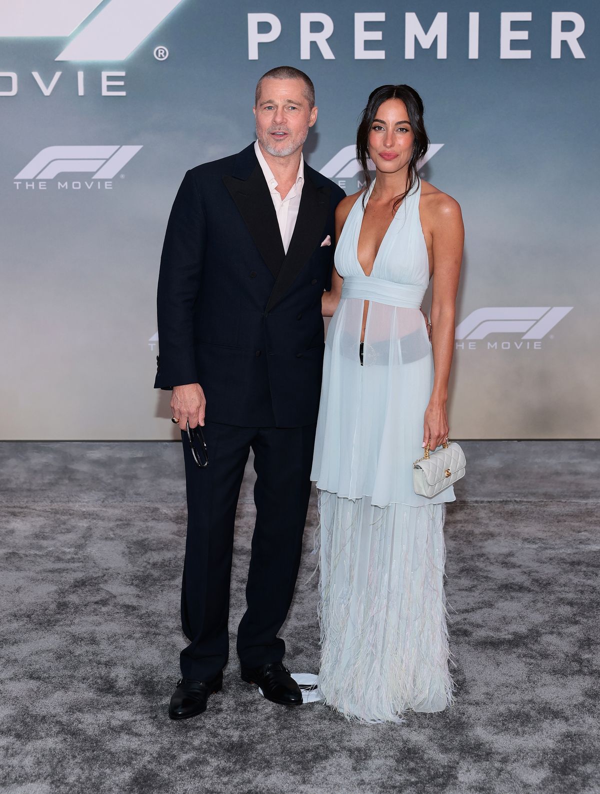 NEW YORK, NEW YORK - JUNE 16: Brad Pitt and Ines de Ramon attend the Apple Original Films & Warner Bros. Pictures "F1" World Premiere in Times Square on June 16, 2025 in New York City. (Photo by Dimitrios Kambouris/Getty Images)