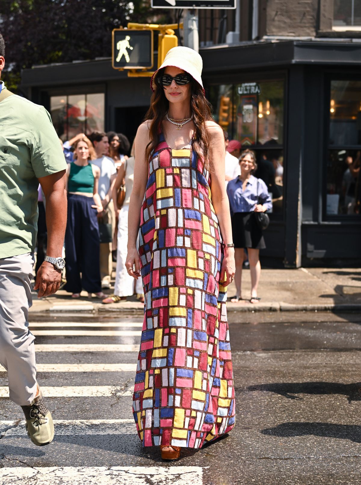 NEW YORK, NEW YORK - JULY 21:  Anne Hathaway is seen on the set of "The Devil Wears Prada 2" in Chelsea on July 21, 2025 in New York City. (Photo by James Devaney/GC Images)