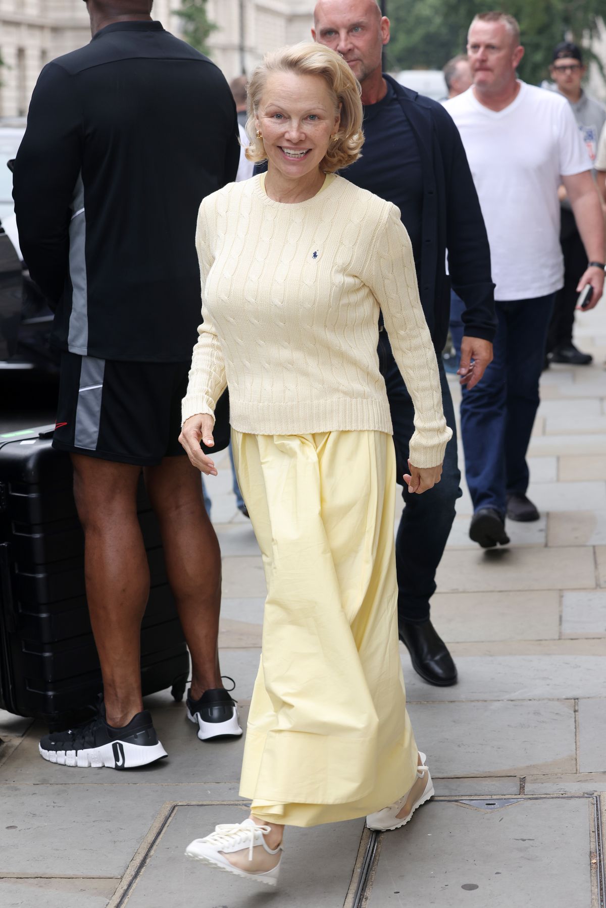 LONDON, ENGLAND - JULY 23: Pamela Anderson leaving the Corinthia Hotel whilst promoting new movie 'The Naked Gun' on July 23, 2025 in London, England. (Photo by Neil Mockford/GC Images)