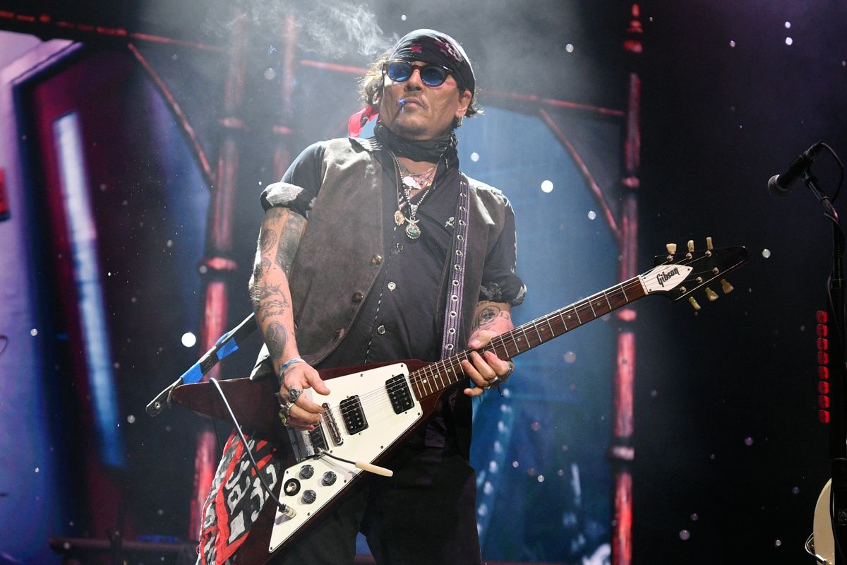 LONDON, ENGLAND - JULY 25:  Johnny Depp performs with Alice Cooper during a concert at The O2 Arena on July 25, 2025 in London, England. (Photo by Jim Dyson/Getty Images)
