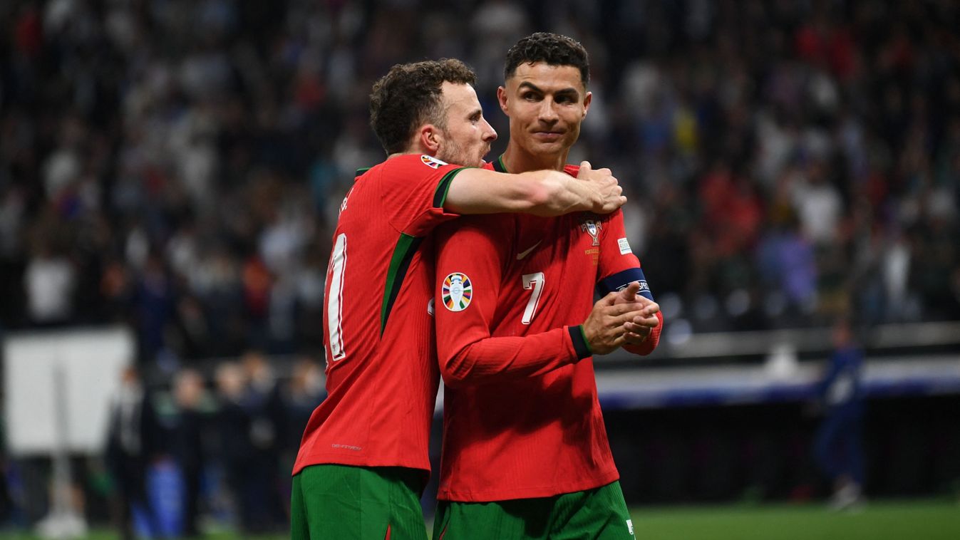FRANKFURT, GERMANY - JULY 01: Cristiano Ronaldo and Diego Jota of Portugal celebrate victory after the UEFA EURO 2024 round of 16 match between Portugal and Slovenia at Deutsche Bank Park in Frankfurt, Germany on July 1, 2024. Hesham Elsherif / Anadolu (P