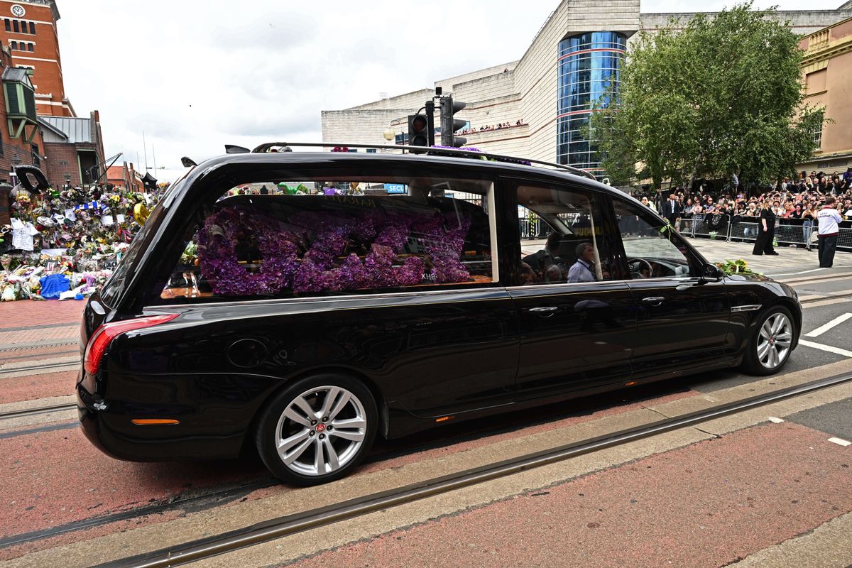 BIRMINGHAM, ENGLAND - JULY 30: The funeral cortege for Ozzy Osbourne travels through his home city of Birmingham on July 30, 2025 in Birmingham, England. The Black Sabbath frontman passed away on July 22nd at the age of 76. His death occurred just a little over two weeks after his final live performance at the 'Back to the Beginning' concert in his hometown of Birmingham. (Photo by Leon Neal/Getty Images)