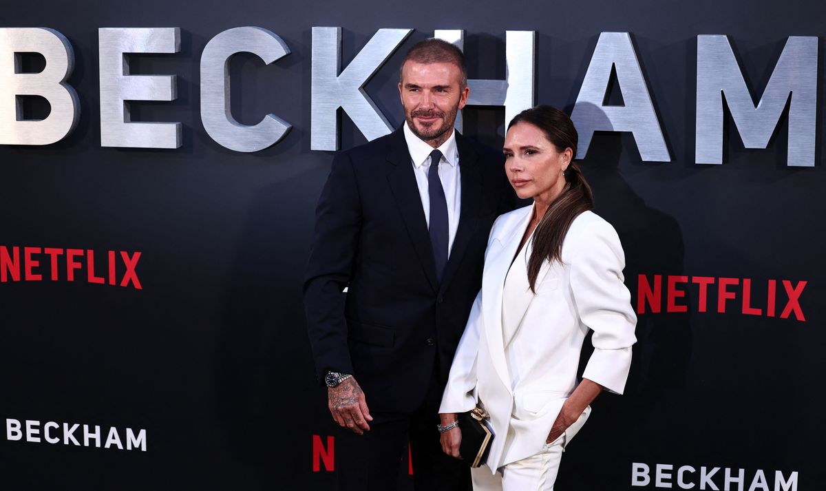 Former England footballer David Beckham and his wife Victoria Beckham pose on the red carpet upon arrival to attend the Premiere of "Beckham" in London on October 3, 2023. (Photo by HENRY NICHOLLS / AFP)