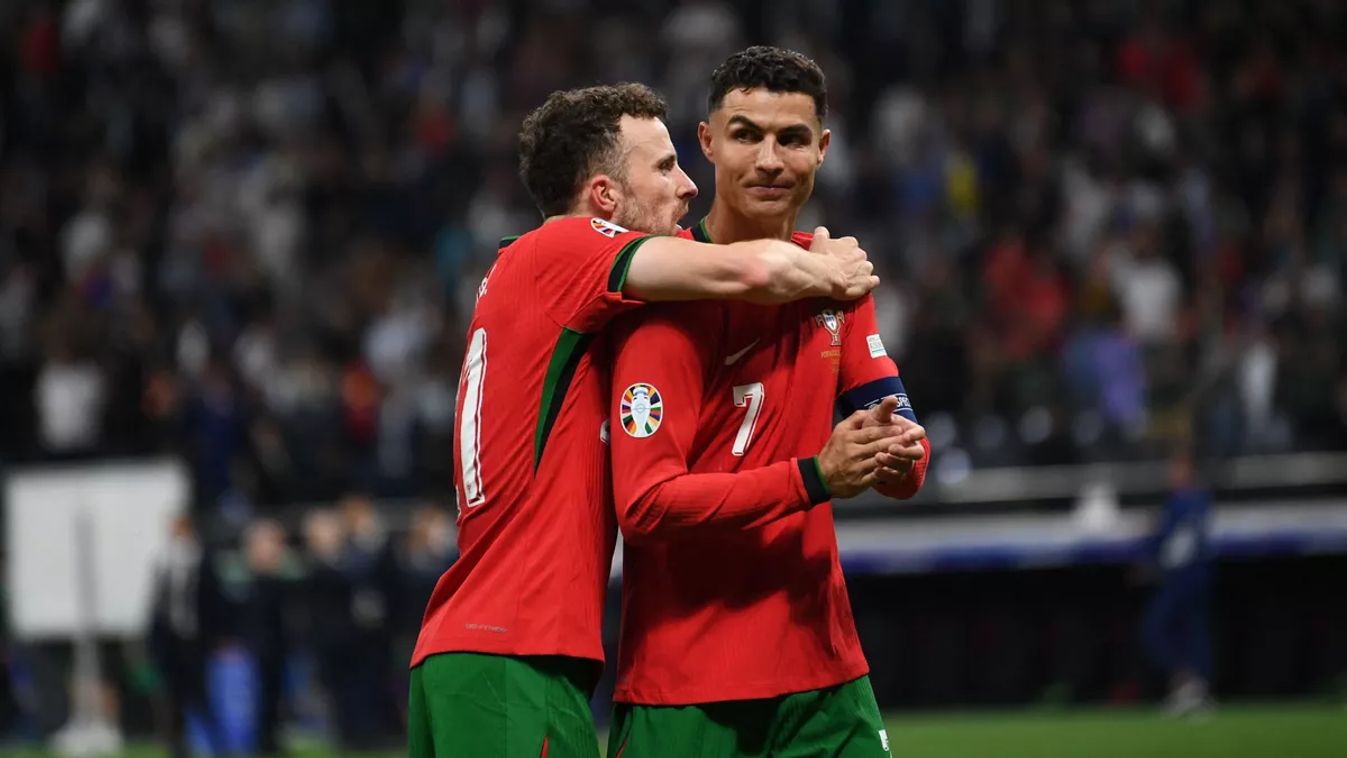 FRANKFURT, GERMANY - JULY 01: Cristiano Ronaldo and Diego Jota of Portugal celebrate victory after the UEFA EURO 2024 round of 16 match between Portugal and Slovenia at Deutsche Bank Park in Frankfurt, Germany on July 1, 2024. Hesham Elsherif / Anadolu (P