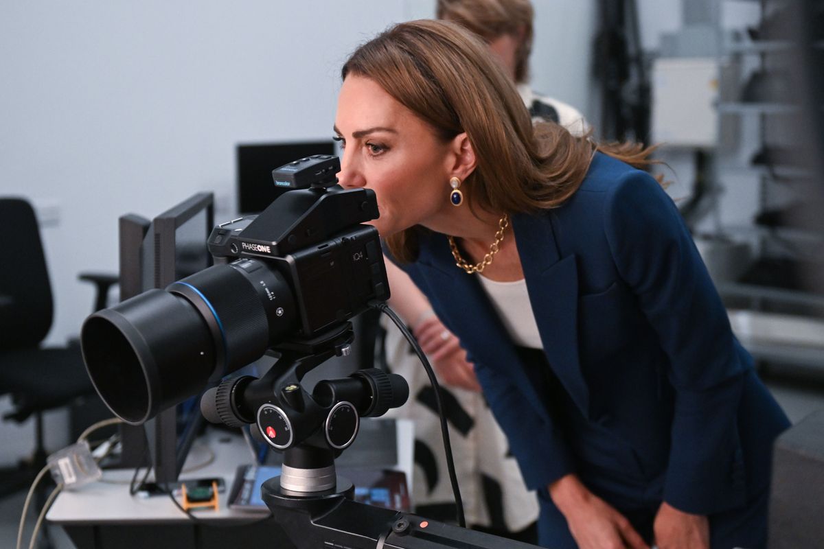 LONDON, ENGLAND - JUNE 10: Catherine, Princess of Wales explores the Photography studio during a visit to the V&A East Storehouse on June 10, 2025 in London, England. Opened on 31 May, V&A East Storehouse reinvents the idea of a museum store and offers free, unprecedented public access to the V&A collections and archives. (Photo by Eddie Mulholland - WPA Pool/Getty Images)