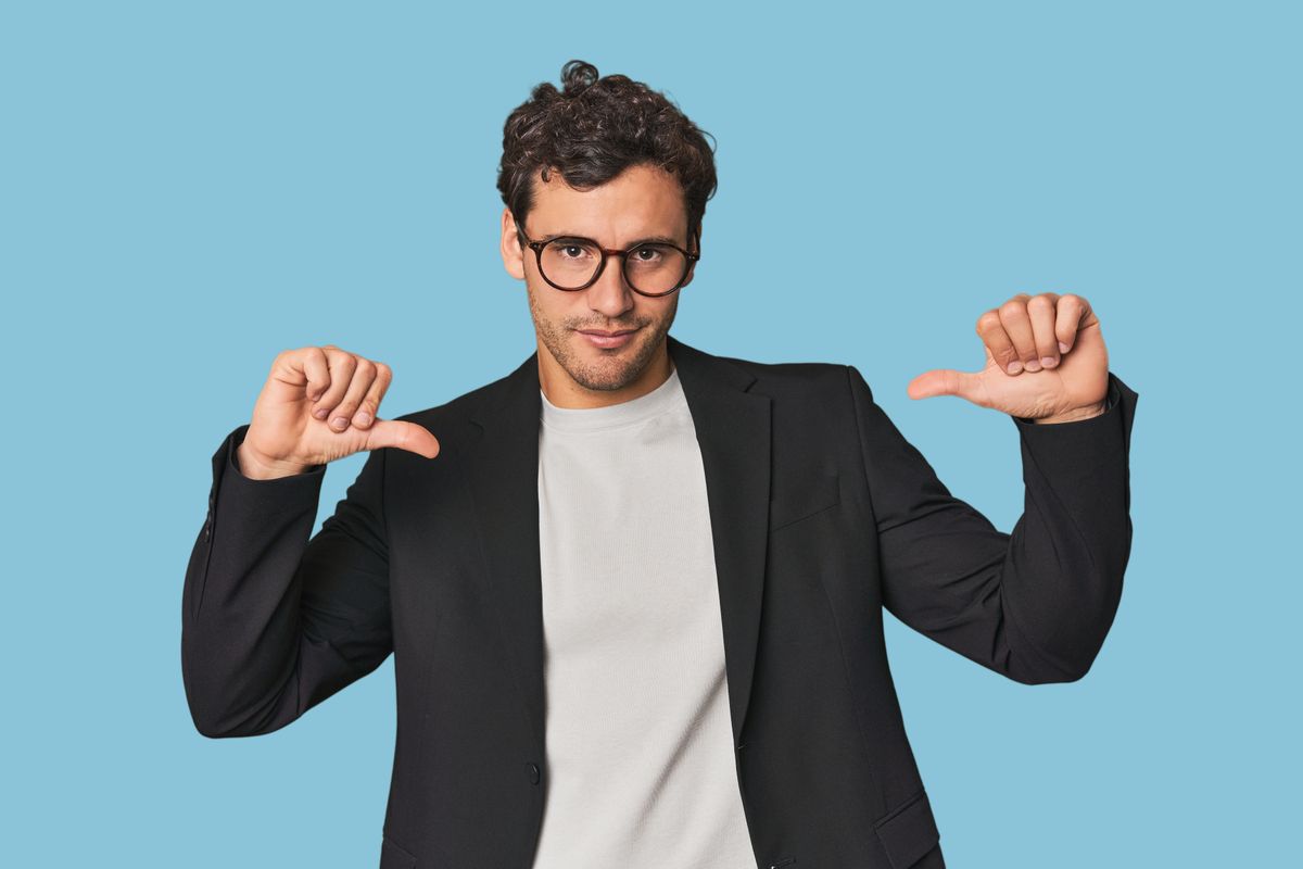 Young Hispanic businessman feels proud and self confident, example to follow.