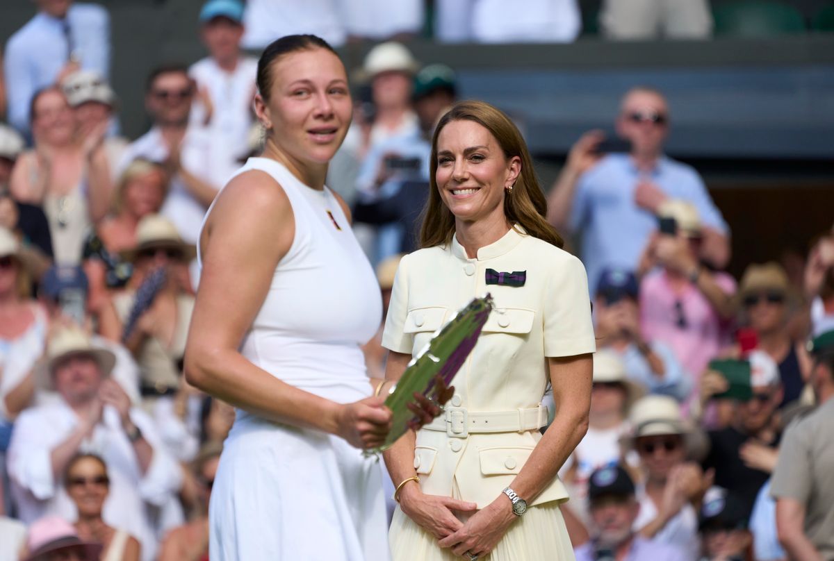 LONDON, ENGLAND - JULY 12: Her Royal Highness The Princess of Wales, Catherine, and Amanda Anisimova of the United States with the loser's plate after the Ladies' final on Centre Court on day thirteen of The Championships Wimbledon 2025 at All England Lawn Tennis and Croquet Club on July 12, 2025 in London, England. (Photo by Peter van den Berg/ISI Photos/ISI Photos via Getty Images)