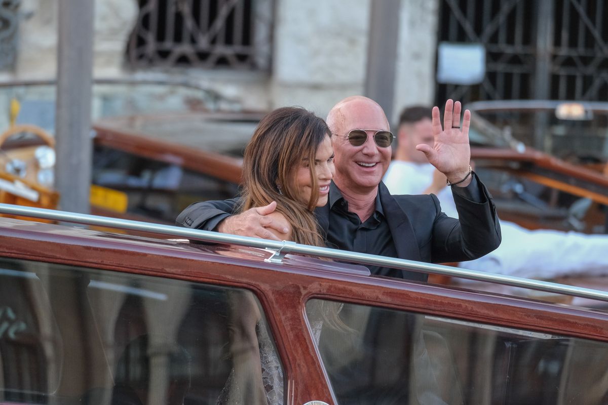 VENICE, ITALY - JUNE 28: Jeff Bezos and Lauren Sanchez are seen leaving the Aman Hotel for a party at the Arsenale on June 28, 2025 in Venice, Italy. (Photo by Stefano Mazzola/GC Images)