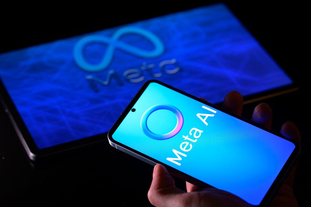 The Meta AI logo is displayed on a mobile phone with the Meta logo visible on a tablet in this photo illustration in Brussels, Belgium, on January 26, 2025. (Photo by Jonathan Raa/NurPhoto) (Photo by Jonathan Raa / NurPhoto via AFP)