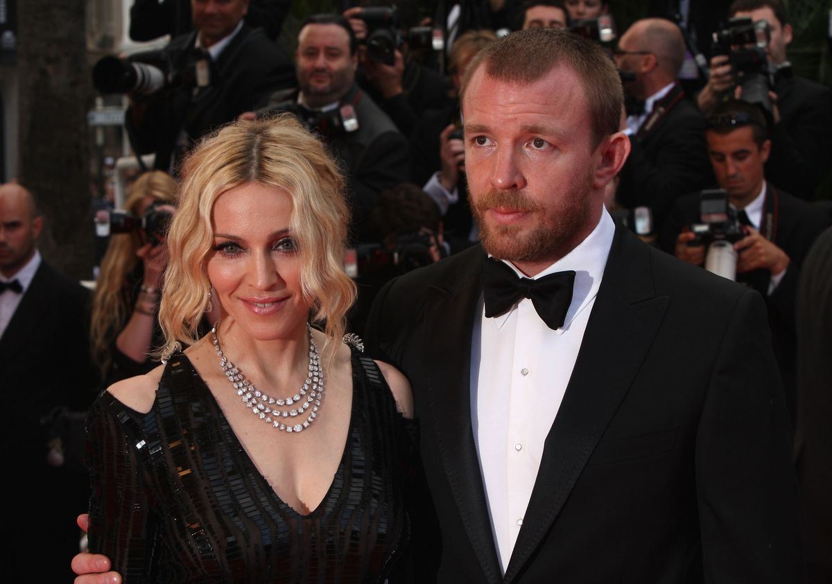 CANNES, FRANCE - MAY 21:  Madonna and husband director Guy Ritchie arrive at the  'I Am Because We Are'  Premiere at the Palais des Festivals during the 61st International Cannes Film Festival on May 21, 2008 in Cannes, France.  (Photo by Gareth Cattermole/Getty Images)