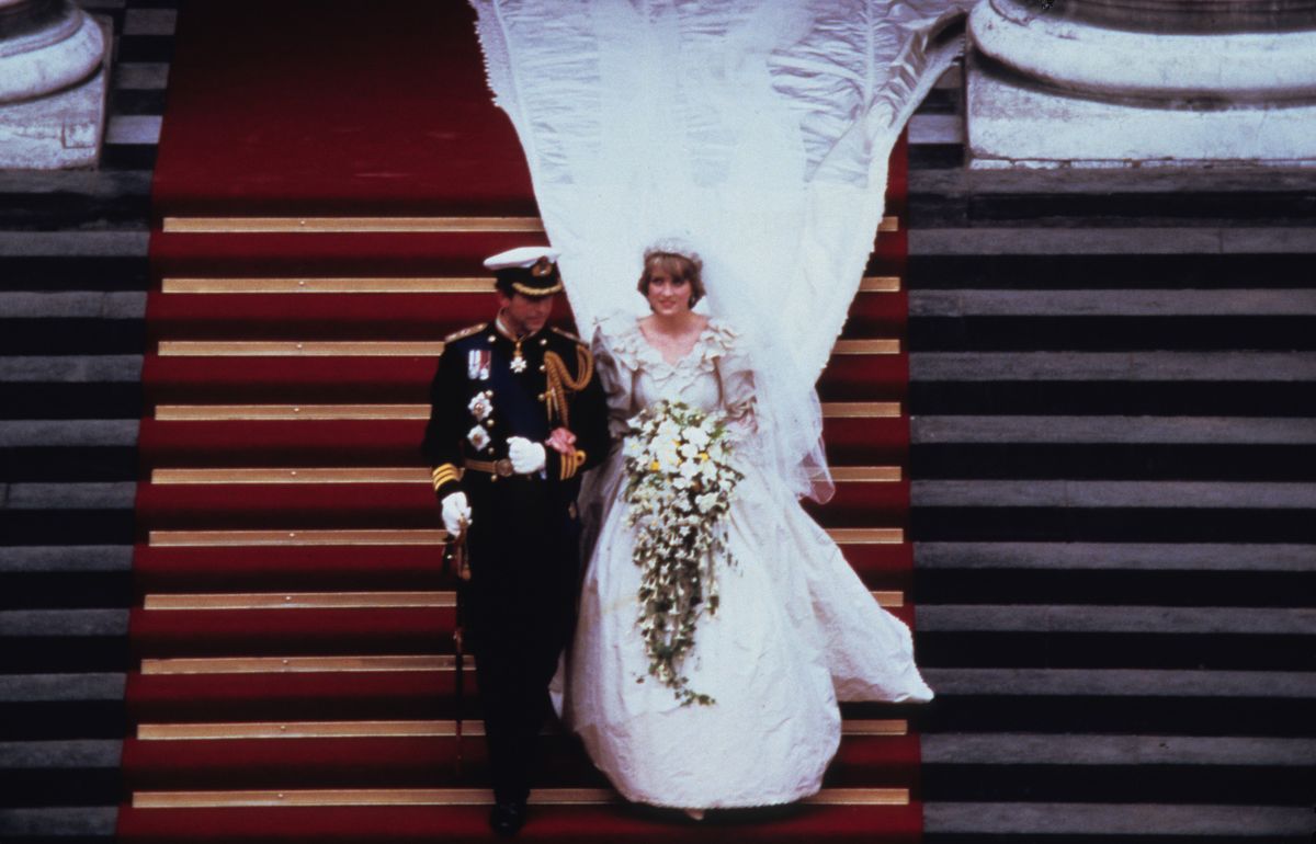LONDON, ENGLAND - JULY 29: Prince Charles, Prince of Wales and Diana, Princess of Wales, wearing a wedding dress designed by David and Elizabeth Emanuel and the Spencer family Tiara, leave St. Paul's Cathedral following their wedding on July 29, 1981 in London, England. (Photo by Anwar Hussein/Getty Images)