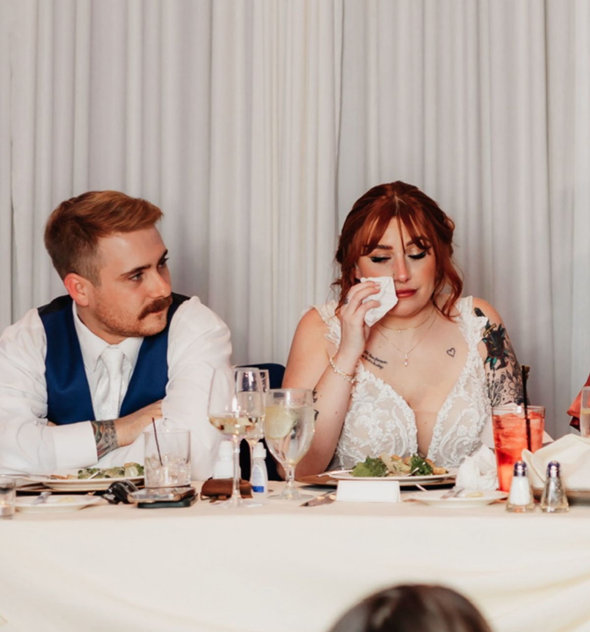 KennedyNews/SheenaAnnePhotography (PIC SHOWS: KELLY STECH, 30, HOLDING A HANDKERCHIEF TO HER EYE ON HER WEDDING DAY DUE TO HER FACIAL PARALYSIS) A bride became so stressed planning her big day it left her face PARALYSED - and unable to smile in wedding photos. Kelly Stech, who lives in Illinois, Chicago, US, had spent a year organising her dream wedding to her now-husband Benjamin Stech after becoming engaged in July 2022. The couple, who began dating in early-2020 after matching on Tinder, forked out $50,000 on their dream day. DISCLAIMER: While Kennedy News and Media uses its best endeavours to establish the copyright and authenticity of all pictures supplied, it accepts no liability for any damage, loss or legal action caused by the use of images supplied and the publication of images is solely at your discretion. SEE KENNEDY NEWS COPY - 0161 697 4266