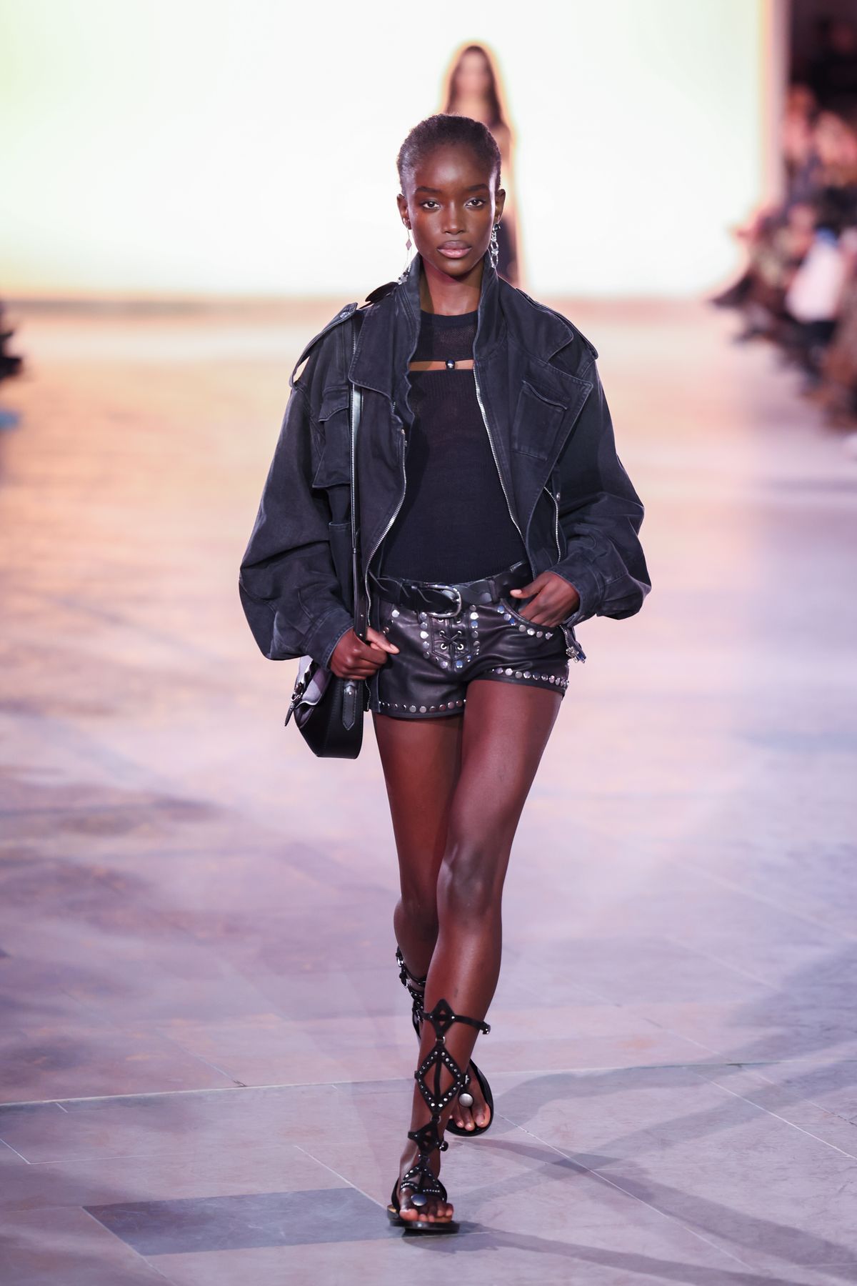PARIS, FRANCE - SEPTEMBER 29: (EDITORIAL USE ONLY - For Non-Editorial use please seek approval from Fashion House) A model walks the runway during the Isabel Marant Paris Womenswear Spring-Summer 2025 show as part of Paris Fashion Week on September 29, 2024 in Paris, France. (Photo by Peter White/Getty Images)
