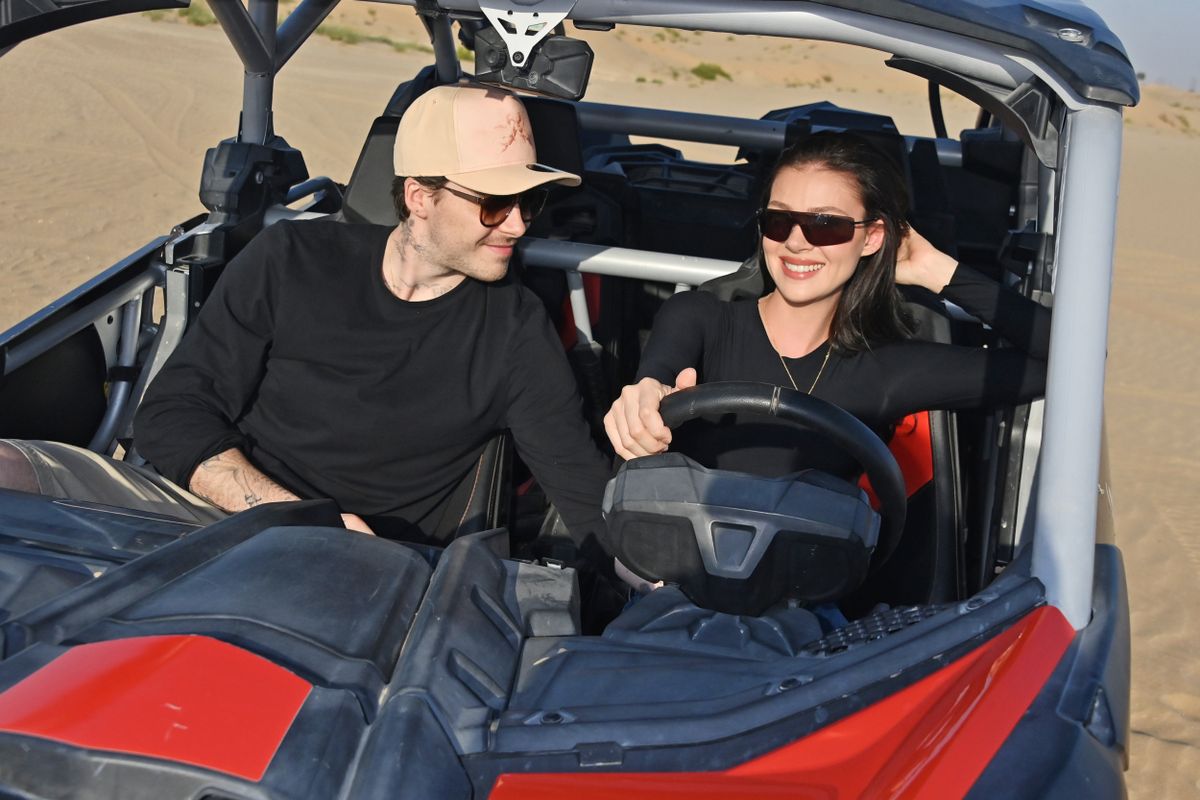 ABU DHABI, UNITED ARAB EMIRATES - DECEMBER 07: Brooklyn Beckham and Nicola Peltz take on the Abu Dhabi sands on a Desert Safari, adding excitement to their romantic getaway, on December 7, 2024 in Abu Dhabi, United Arab Emirates. (Photo by Dave Benett/Getty Images for Experience Abu Dhabi)