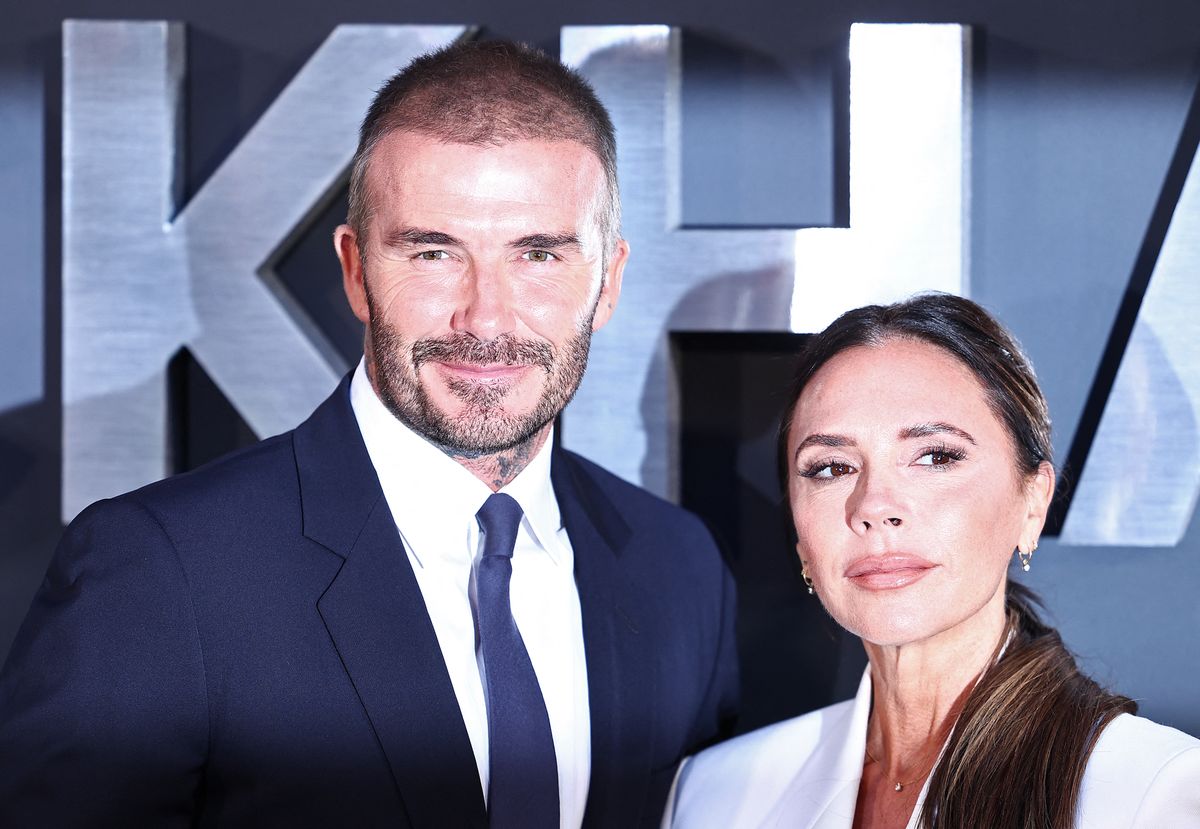 Former England footballer David Beckham and his wife Victoria Beckham pose on the red carpet upon arrival to attend the Premiere of "Beckham" in London on October 3, 2023. (Photo by HENRY NICHOLLS / AFP)