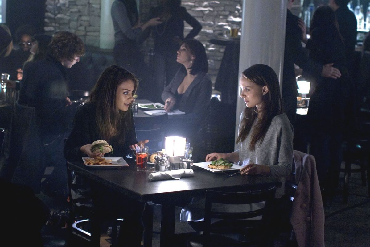 RELEASE DATE: 1 December 2010. TITLE: Black Swan. STUDIO: 20th Century Fox. PLOT: A thriller that zeros in on the relationship between a veteran ballet dancer and a rival. PICTURED: MILA KUNIS as Lilly and NATALIE PORTMAN as Nina.