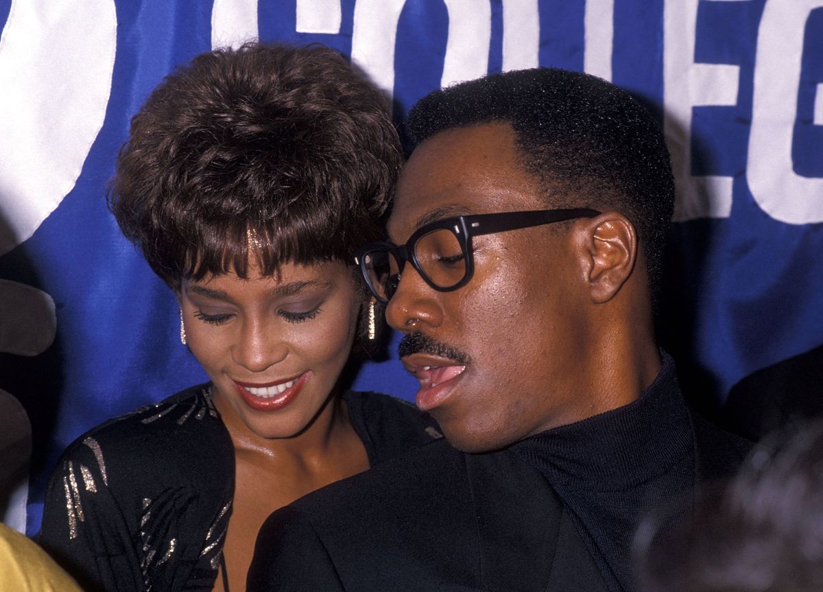 BEVERLY HILLS, CA - NOVEMBER 15:   Singer Whitney Houston and comedian/actor Eddie Murphy attend the United Negro College Fund's 10th Annual "Lou Rawls Parade of Stars" Telethon Kick-Off Party on November 15, 1989 at L'Ermitage in Beverly Hills, California. (Photo by Ron Galella, Ltd./Ron Galella Collection via Getty Images)