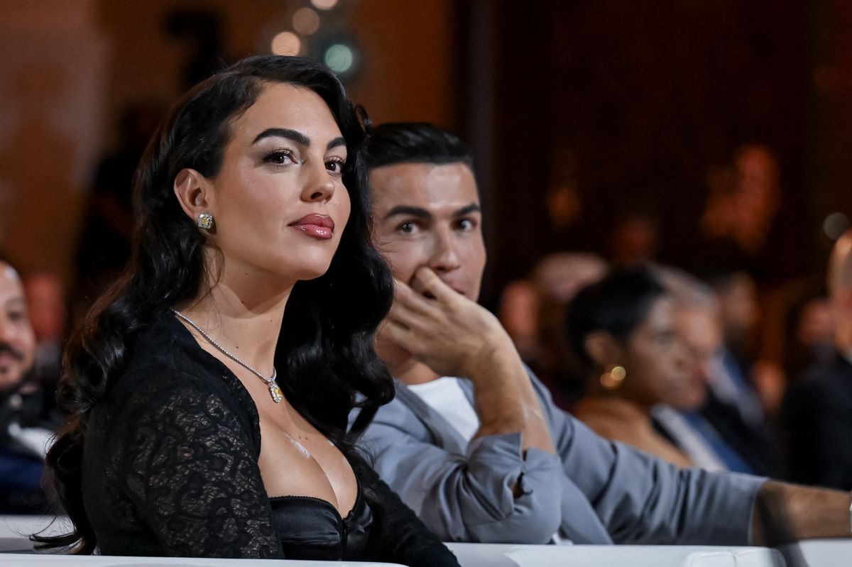 DUBAI, UNITED ARAB EMIRATES - DECEMBER 27: Al-Nassr player Cristiano Ronaldo (2nd L) and Georgina Rodriguez (L) attend the Globe Soccer Dubai Awards 2024 as part of the Dubai International Sports Conference 2024 in Dubai, United Arab Emirates (UAE) on December 27, 2024. Waleed Zein / Anadolu (Photo by Waleed Zein / Anadolu via AFP)