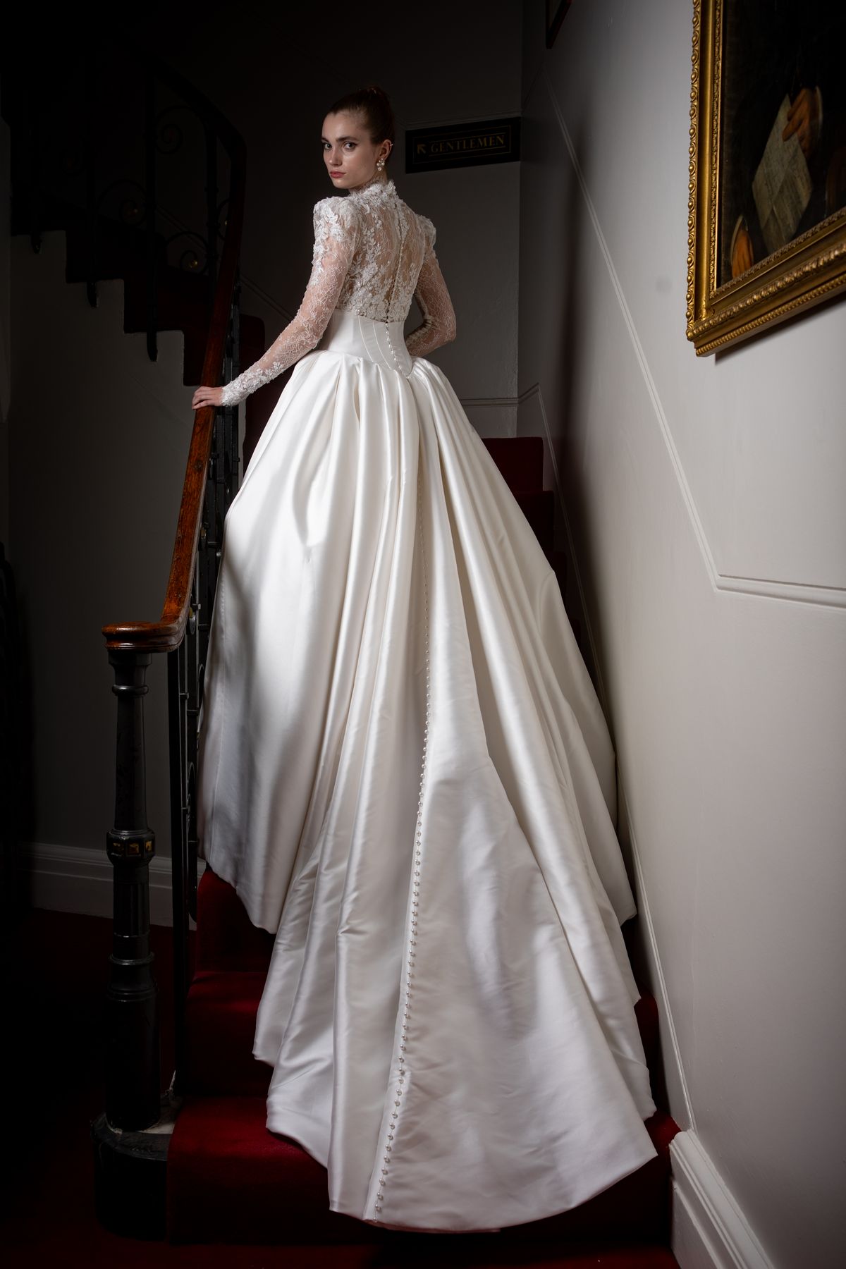 LONDON, ENGLAND - SEPTEMBER 06: A debutante poses during the Queen Charlotte's 246th Anniversary Ball at One Whitehall Place on September 06, 2025 in London, England. The group of meticulously selected debutantes wore dresses designed by Mrs. Josephine Scott. Gowns as they celebrated their year of charity fund raising and etiquette classes, and debuted at The Queen Charlotte's Ball. This year's charity was GamMed. The London Season, which is rich in history, was formed over two hundred years ago when the custom of returning to London at the end of the hunting season was celebrated with glittering balls and high society events. King George III introduced the Queen Charlotte's Ball in 1780 to celebrate his wife's birthday and debutantes were traditionally presented to the King or Queen until 1958. (Photo by Shane Anthony Sinclair/Getty Images)