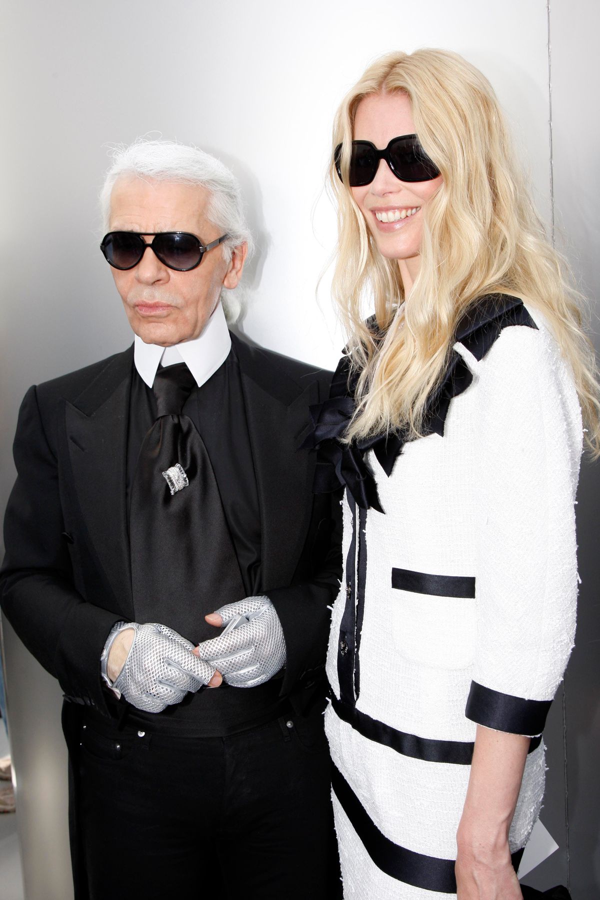 PARIS - JULY 1:  Karl Lagerfeld and Claudia Schiffer attend backstage at the Chanel Haute Couture Autumn Winter 2008 fashion show on July 1, 2008 in Paris, France. (Photo by Michel Dufour/WireImage)