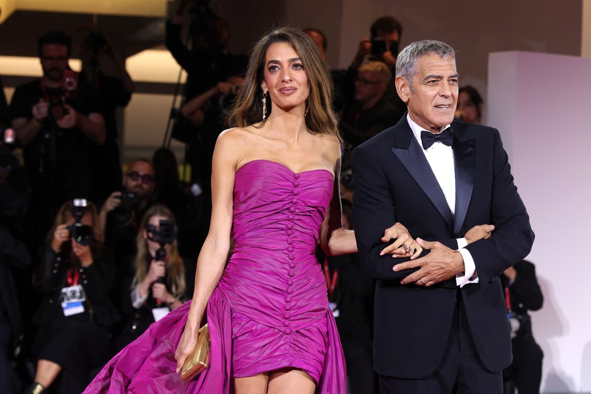 VENICE, ITALY - AUGUST 28:  Amal Clooney and George Clooney during the "Jay Kelly" red carpet during the 82nd Venice International Film Festival on August 28, 2025 in Venice, Italy. (Photo by Gisela Schober/Getty Images)