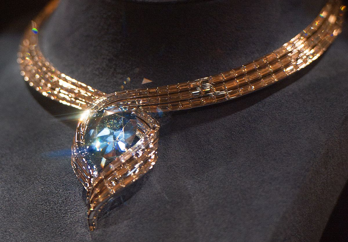 TO GO WITH AFP STORY by Virginie Montet, US-museum-art-diamond
The "Hope Diamond" seen in its new temporary setting called "Embracing Hope" is seen during its first day shown to the public on November 18, 2010, at the Smithsonian National Museum of Natural History in Washington, DC.   Set in platinum, the new design surrounds the legendary deep-blue diamond with an extraordinary 340 baguette diamonds and took more than 8 months to create by jewelers at Harry Winston Inc.          AFP Photo/Paul J. Richards (Photo by PAUL J. RICHARDS / AFP)