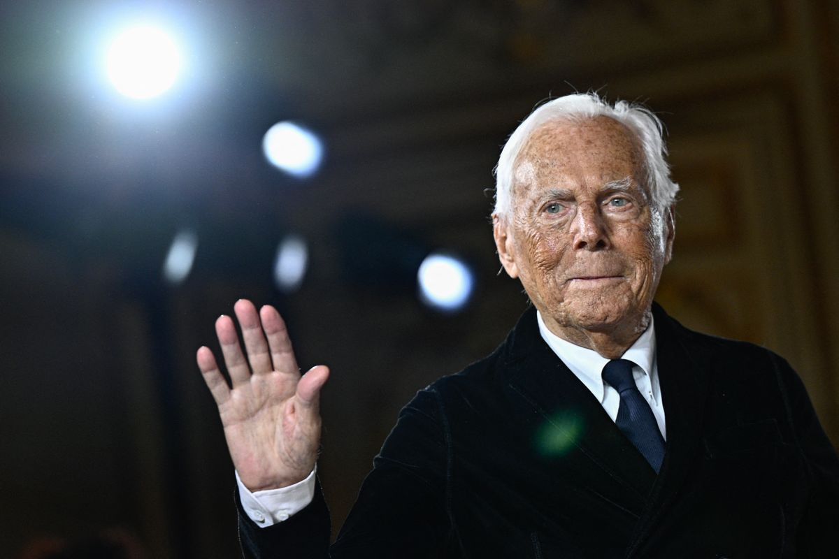 (FILES) Italian designer Giorgio Armani acknowledges the applause at the end of his presentation for Armani Prive during the Women's Haute-Couture Spring/Summer 2025 Fashion Week to mark its 20th anniversary, in Paris on January 28, 2025. Italian fashion great Giorgio Armani has died at the age of 91 "surrounded by his loved ones", his company said on September 4, 2025. (Photo by JULIEN DE ROSA / AFP)