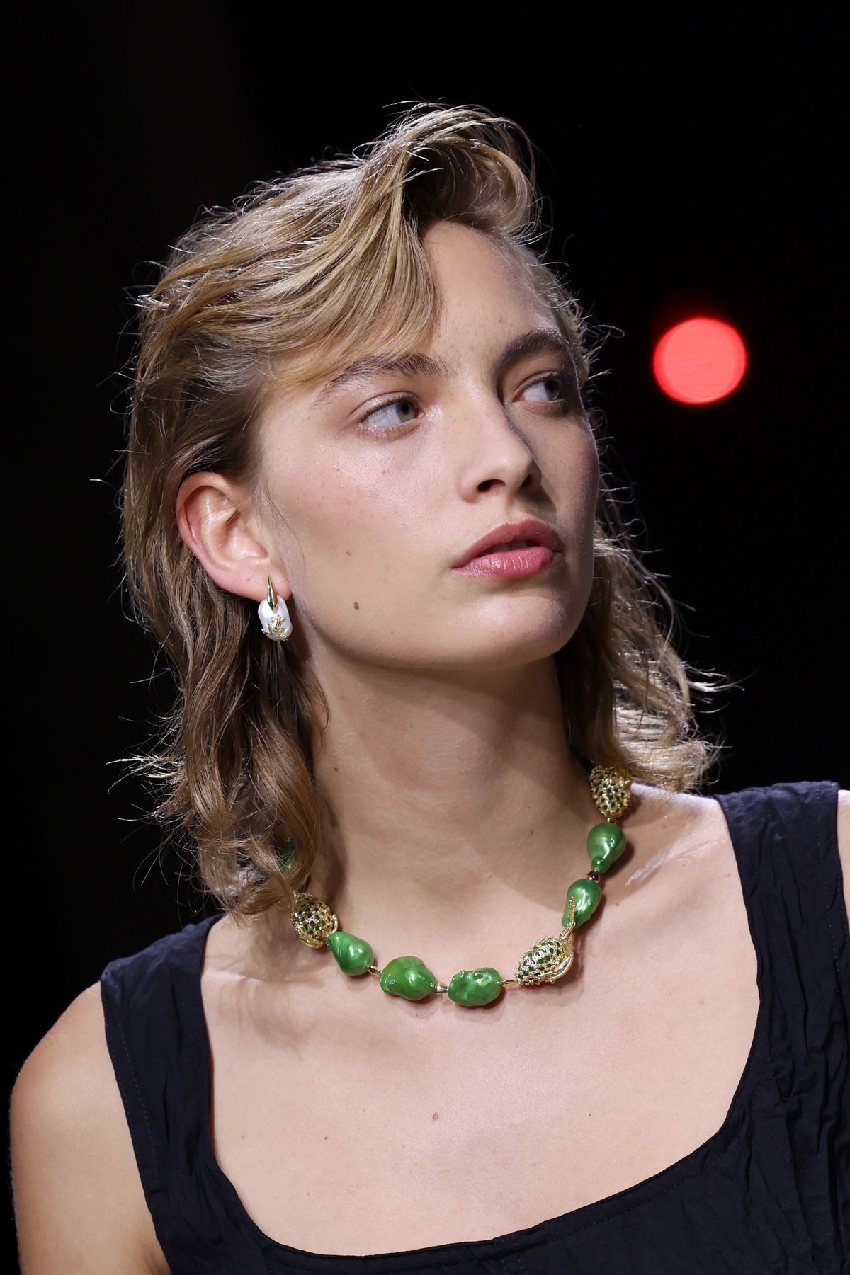 MILAN, ITALY - SEPTEMBER 21: A model, fashion detail, walks the runway at the Bottega Veneta fashion show during the Milan Womenswear Spring/Summer 2025 on September 21, 2024 in Milan, Italy. (Photo by Vittorio Zunino Celotto/Getty Images)
