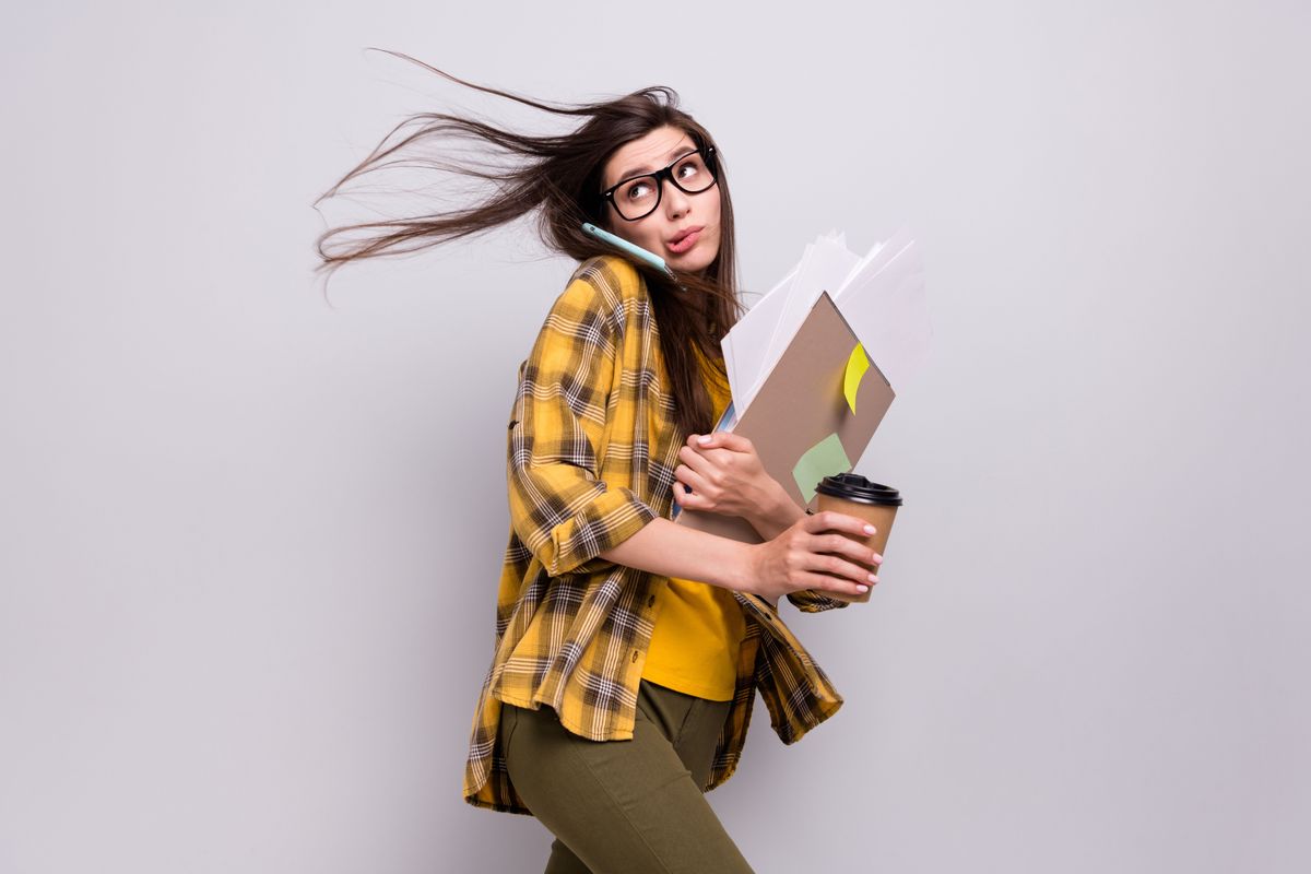 Profile side photo of young woman talk smartphone hurry go walk project deadline overworked isolated over grey color background