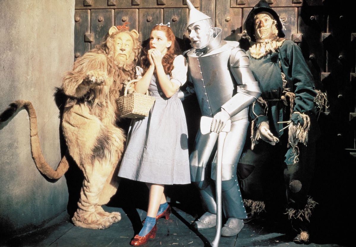 1939; The 1939 Wizard Of Oz. Original Film Title: The 1939 Wizard Of Oz, PICTURED: JUDY GARLAND, BERT LAHR, RAY BOLGER, JACK HALEY, Composer: Herbert Stothart, Director: Victor Fleming, IN CAST: Bert Lahr, Jack Haley, Billie Burke, Ray Bolger, Frank Morgan, Margaret Hamilton, Judy Garland, Pat Walshe Mandatory Credit: Photo by M.G.M/Entertainment Pictures. (©) Copyright 1939 by M.G.M.