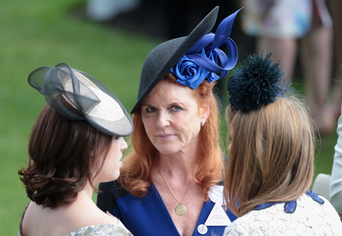 ASCOT, ENGLAND - JUNE 19: Princess Eugenie, Sarah Ferguson, Duchess of York and Princess Beatrice hold hands in the parade ring on day 4 of Royal Ascot at Ascot Racecourse on June 19, 2015 in Ascot, England. (Photo by Chris Jackson/Getty Images)