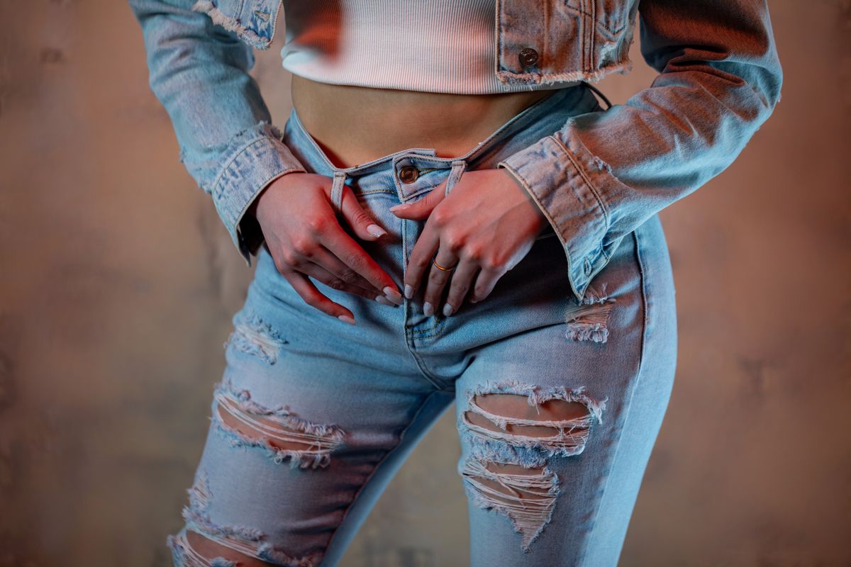 Explore the latest trends in denim fashion showcasing the stylish appeal of distressed jeans