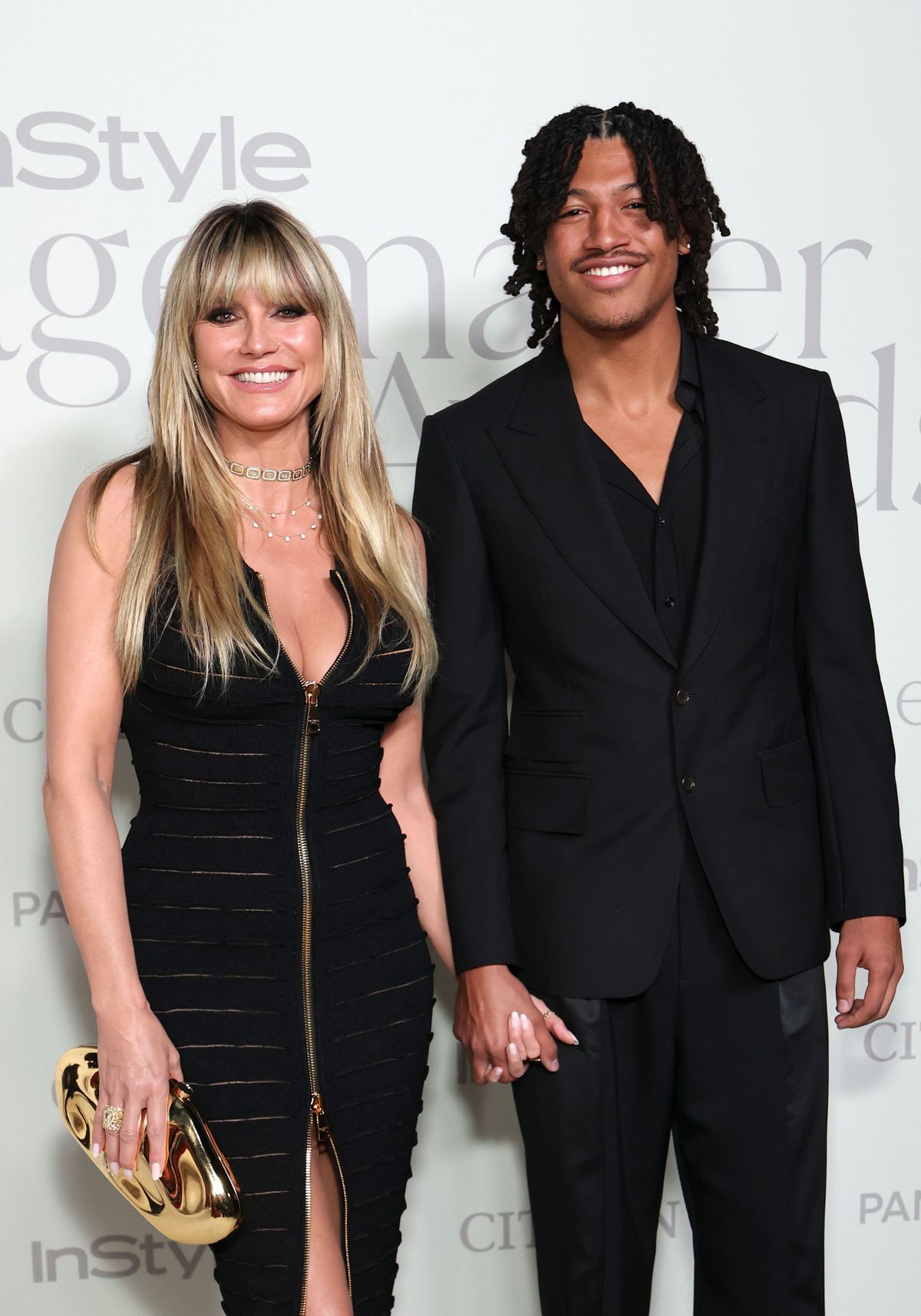 BEL AIR, CALIFORNIA - OCTOBER 23: (L-R) Heidi Klum and Henry Samuel attend the InStyle Imagemaker Awards 2025 at a Private Residence on October 23, 2025 in Bel Air, California. (Photo by Monica Schipper/Getty Images)