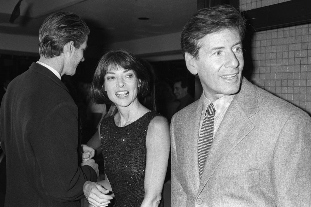 Anna Wintour and Calvin Klein attend a book party hosted by Anna and Calvin to celebrate the publication of Kelly Klein's new book, 'Pools,' featuring some of the world's most exquisite swimming pools, in the pool room of Manhattan's 1 East River Place on October 1, 1992 in New York. Article title: 'Eye: Kelly's Pool Party (Photo by Fairchild Archive/Penske Media via Getty Images)