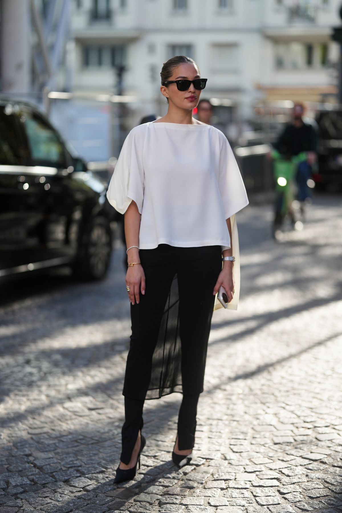 PARIS, FRANCE - SEPTEMBER 30: Sarah Lahbati is seen wearing a white top, black sheer skirt over black pants and black heels outside Zomer during the Womenswear Spring Summer 2026 as part of Paris Fashion Week on September 30, 2025 in Paris, France. (Photo by 305pics/Getty Images)