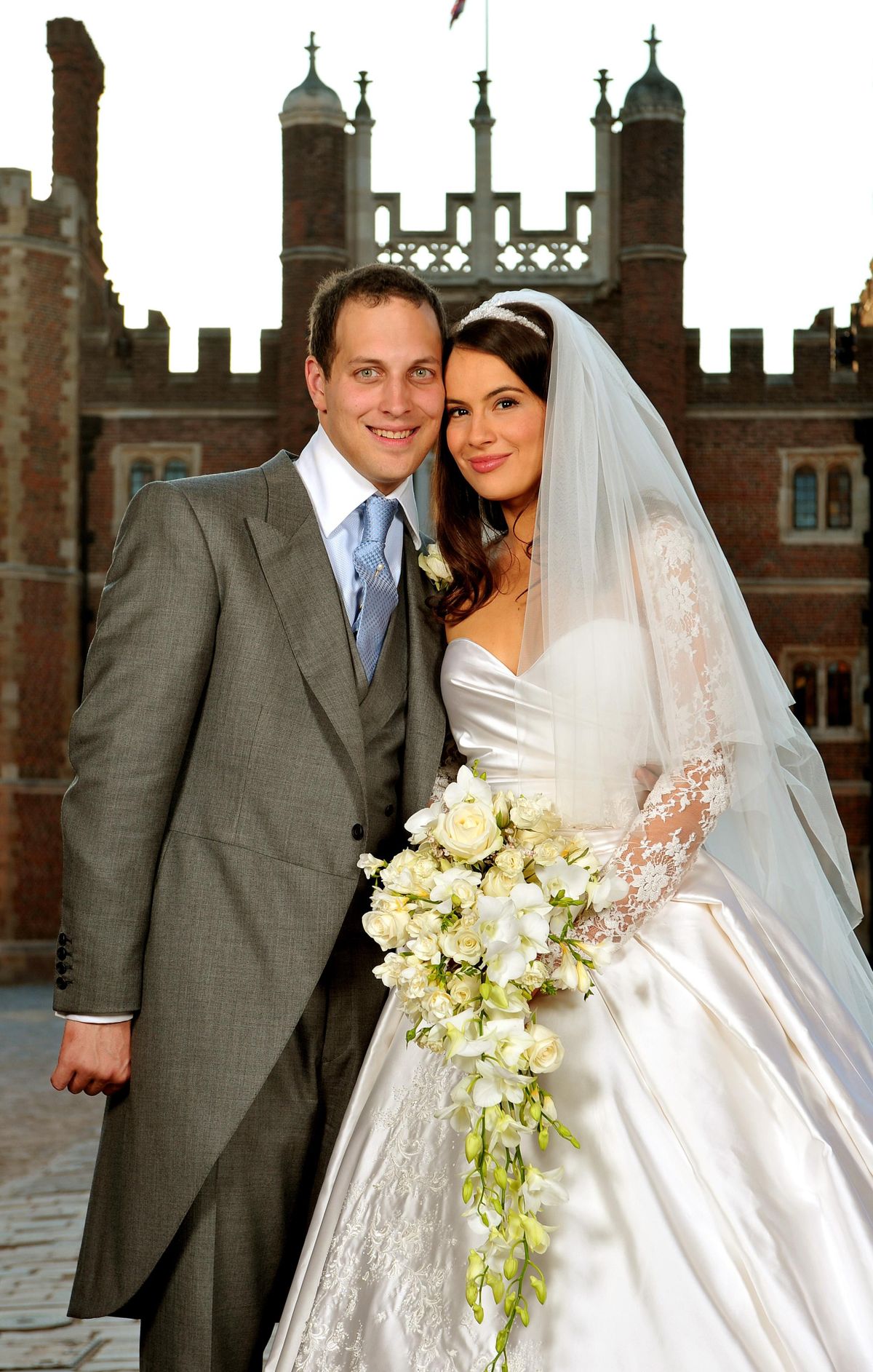 Lord Freddie Windsor poses with his bride Sophie Winkleman in the Base Court, minutes after their wedding in the Chapel Royal at Hampton Court Palace in Surrey. (Photo by John Stillwell/PA Images via Getty Images)